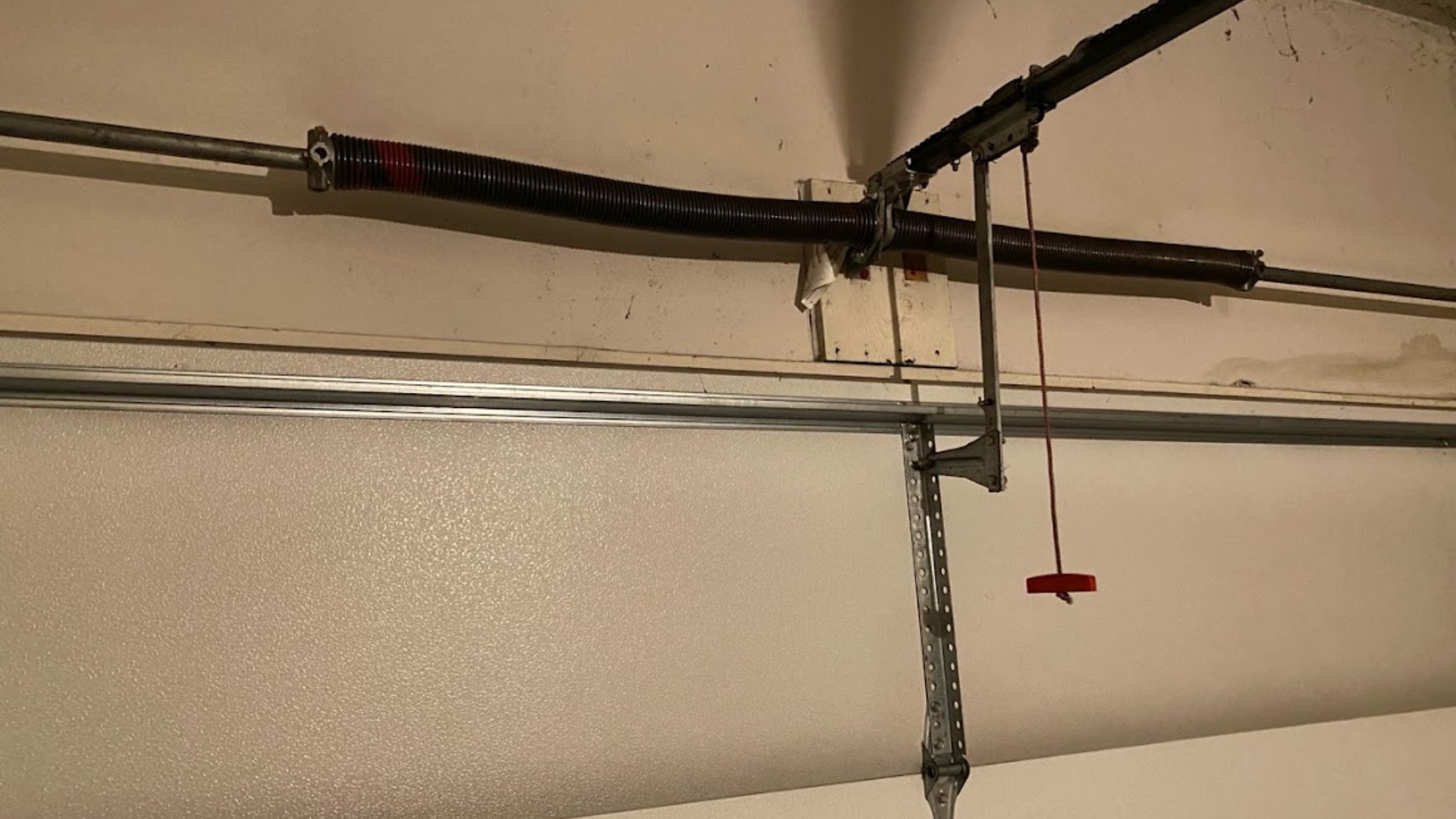 Garage door spring replacement close up