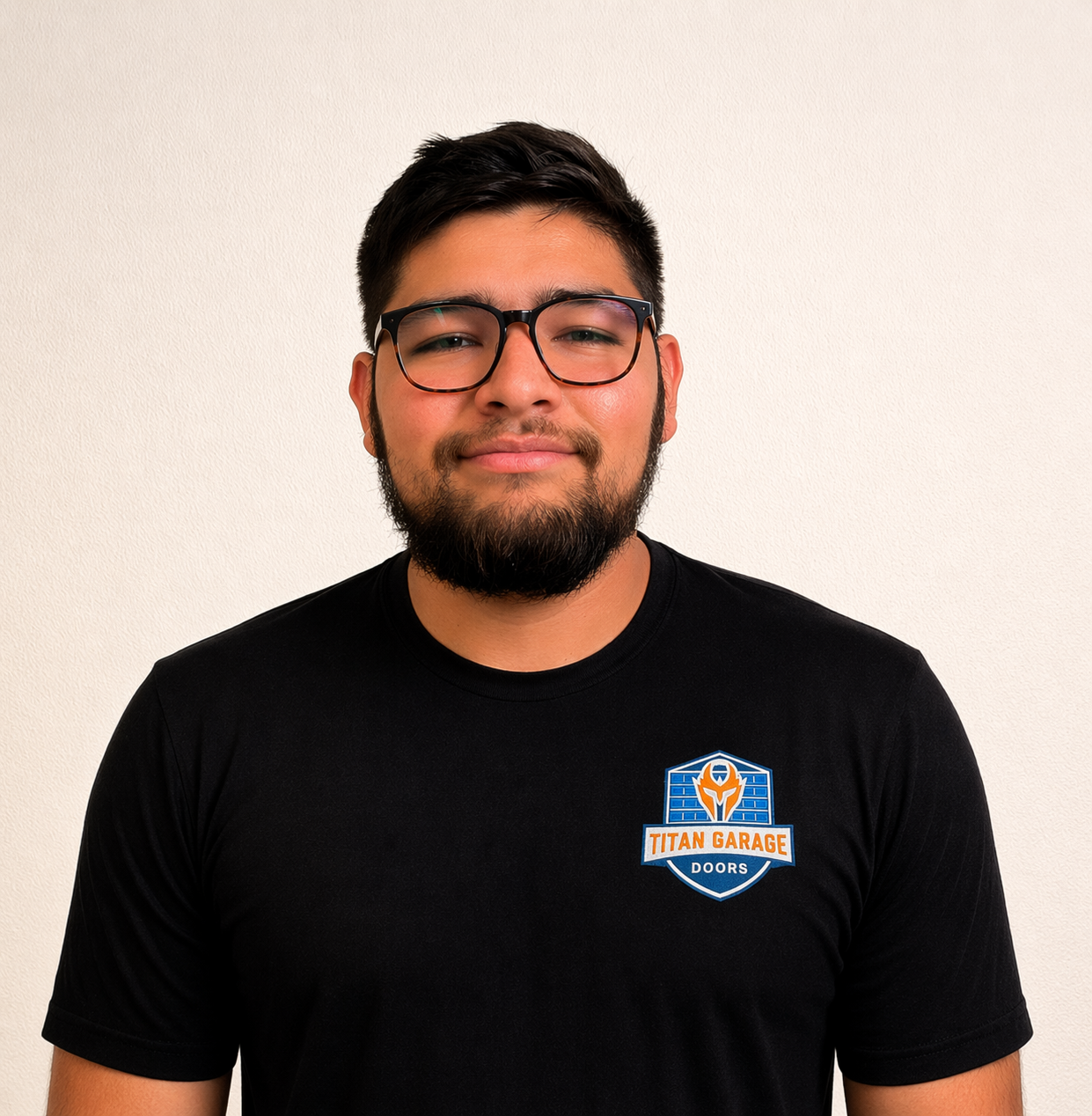 A close-up image of Aidan B., a garage door technician at Titan Garage Doors WI