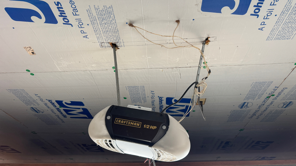 Garage door opener repair close up