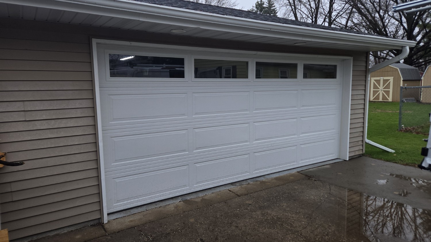 Professional garage door installation with overhead tracks