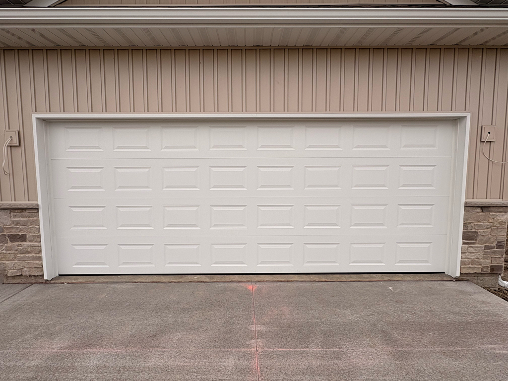 Door Install, 445 Rhonda Rd, New Liberty, Iowa, 52765-1 Residential garage door installation with sectional door panels